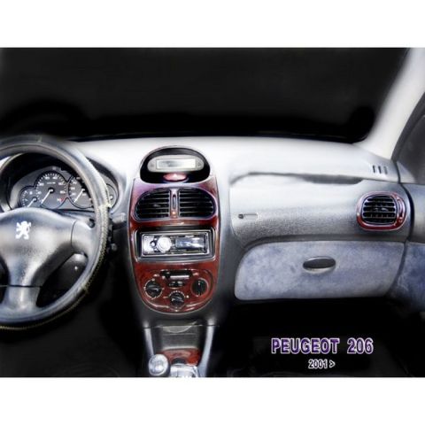 1991 Ford LTD Crown Victoria - Interior view of a Peugeot 206, wood trim accents and an aftermarket audio system.