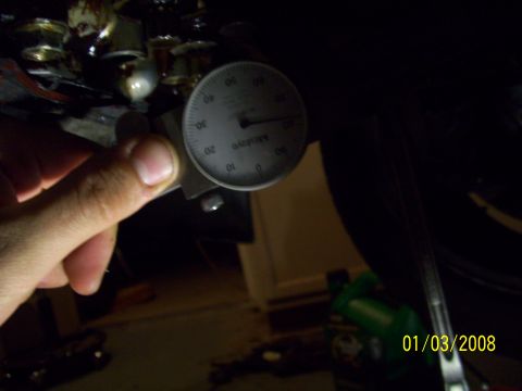 1995 Ford Probe - A dial indicator is used to measure a component, with a date stamp of 01/03/2008 visible in the lower right corner.