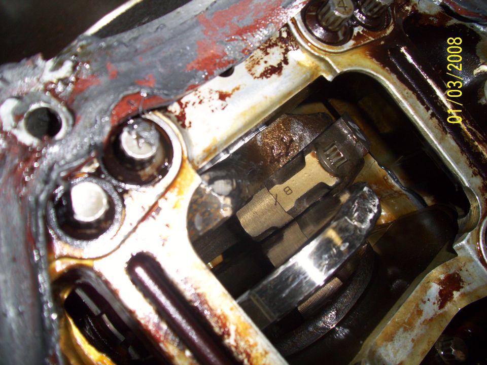Engine part with visible 'B' marking and date stamp 01/03/2008