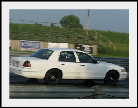 1998 Ford Crown Victoria - Racing her on the Track in Canada fastest time 1/4 was 16.1 @ 86mpg
