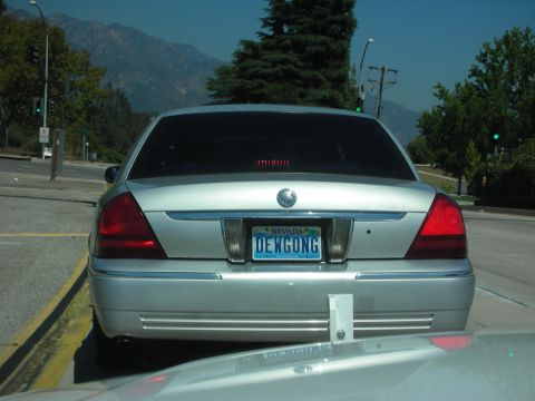 2004 Ford Crown Victoria - Rear view of a silver 2004 Ford Crown Victoria sedan with a Nevada license plate.
