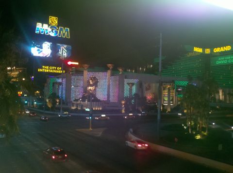 1996 Ford Bronco - Nighttime view of the Las Vegas Strip, the iconic MGM Grand and other illuminated casinos.