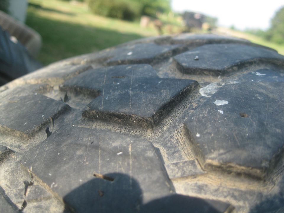 Close-up of aggressive tire tread pattern