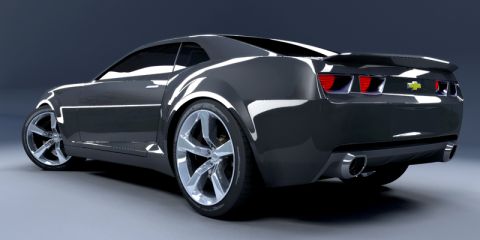 2007 Ford Mustang - This dark sports car features a spoiler and distinctive taillights, viewed from the rear three-quarter angle.