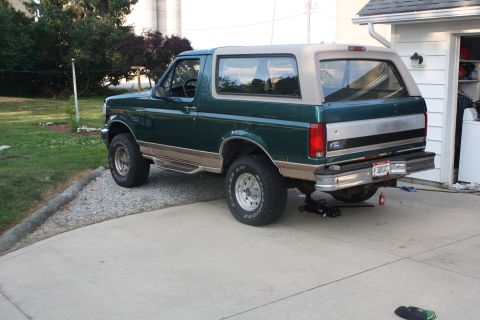 1996 Ford Bronco - This 1996 Ford Bronco is parked in a driveway with a jack under its rear axle.