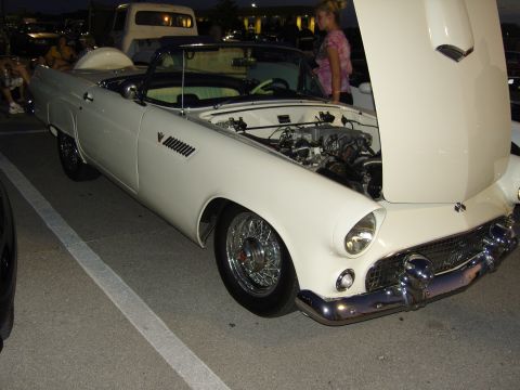 2007 Ford Mustang - A white 1955 Ford Thunderbird convertible is parked with its hood open, revealing the engine compartment.