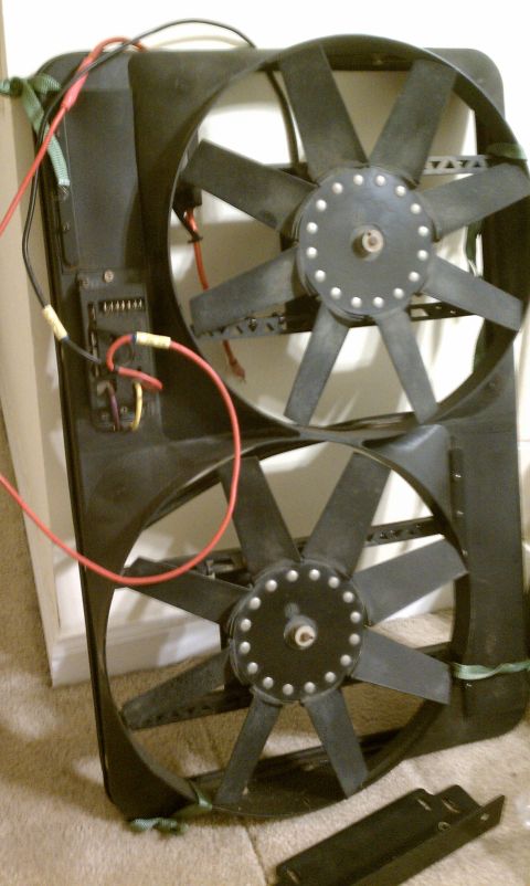 1990 Ford Bronco - Dual radiator fan assembly with wiring harness, likely for a vehicle cooling system.