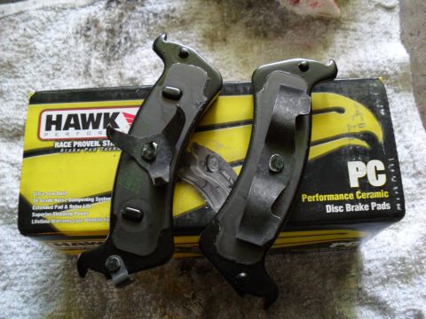 1990 Ford Bronco - Hawk Performance Ceramic Disc Brake Pads are shown on their product packaging.