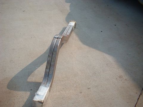 1969 Ford Torino - A chrome bumper part is shown lying on a concrete surface. The registry claims it is from a 1969 Ford Torino, but this cannot be verified f…