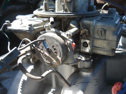 1979 Ford Bronco - A detailed view of a carburetor, likely from an older vehicle, with annotations indicating specific components.
