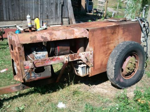 1985 Ford F-150 - This trailer-mounted equipment is heavily rusted and shows signs of age and disuse.