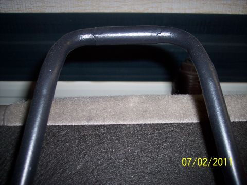 1973 Ford F-250 - A close-up view of a vehicle's interior seat frame, with a date stamp of 07/02/2011.