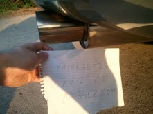 1996 Ford Bronco - Handwritten note with text and a chrome exhaust pipe are visible in the photo.