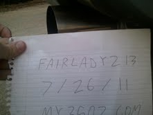 1996 Ford Bronco - Paper with handwritten text including a date and website address.