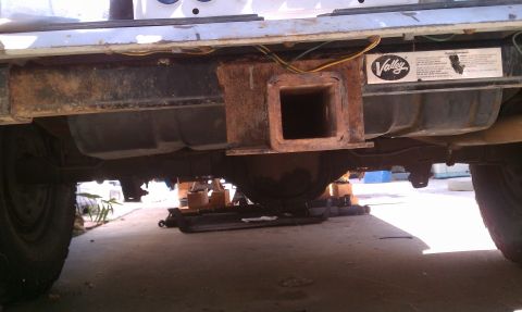 1990 Ford Bronco - Close-up of a vehicle's rear hitch and fuel tank, showing a 'Valley' trailer hitch sticker.