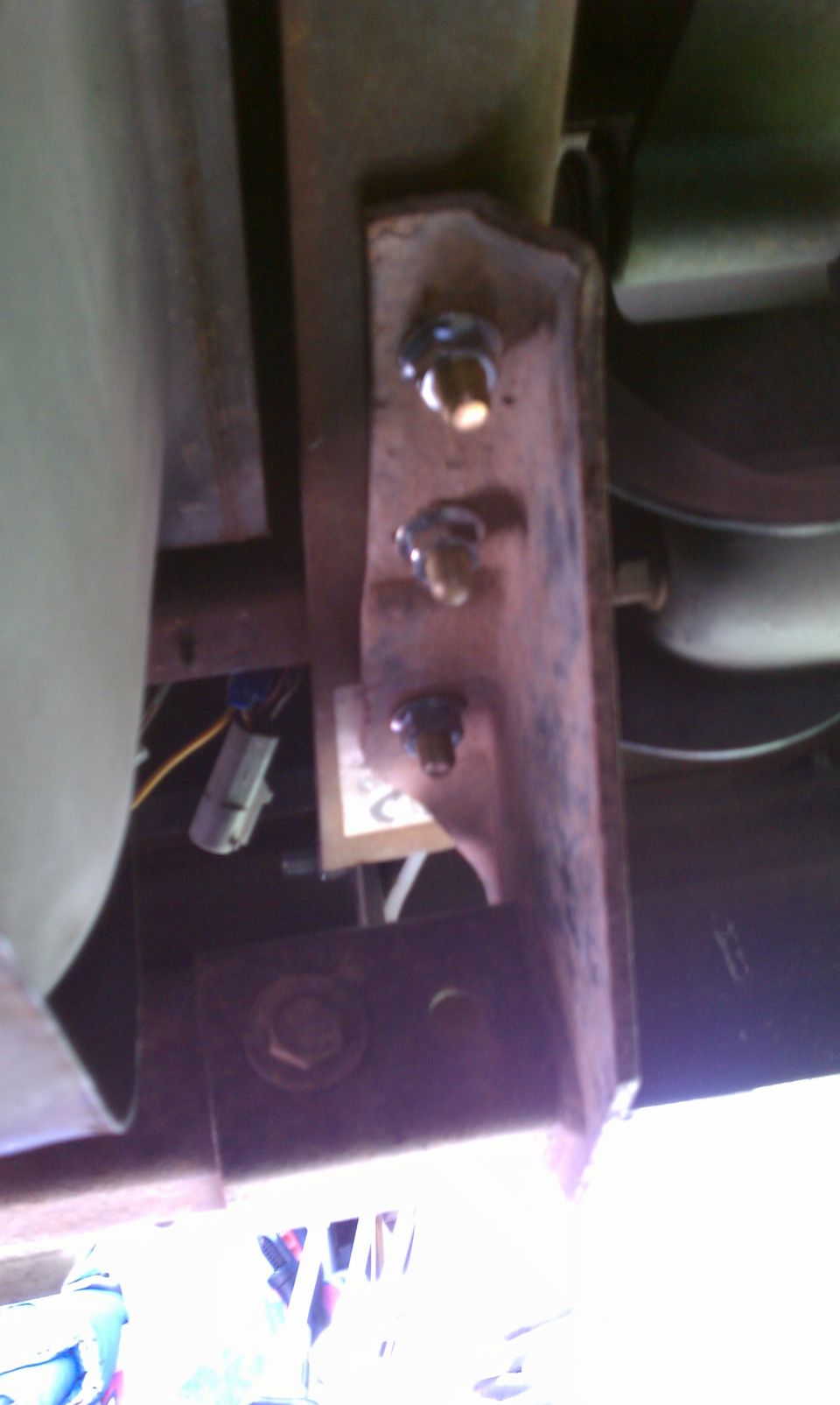 Underbody bracket with three bolts and wiring connector