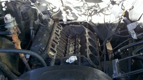 1990 Ford Bronco - The engine block is exposed, revealing the internal workings of the motor.