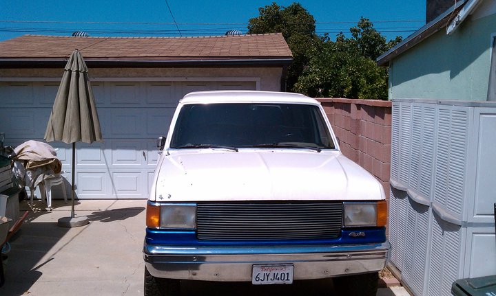 1990 Ford Bronco front view in driveway