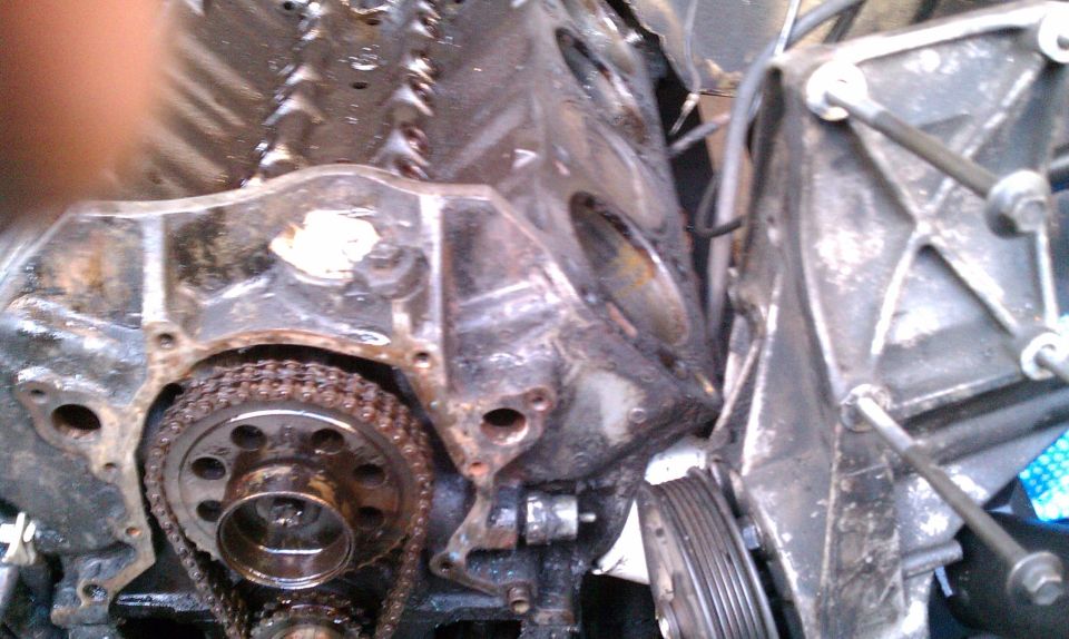Engine block with timing chain and gears, greasy and dirty