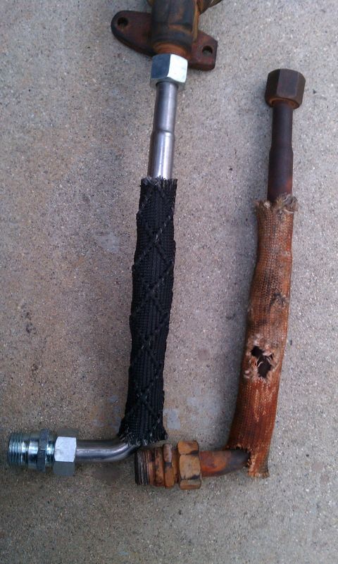 1990 Ford Bronco - Comparison of a new hose with a protective sleeve and an old, damaged hose.