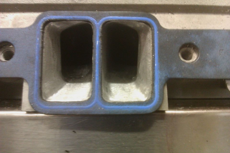 Intake manifold ports with blue gasket seal