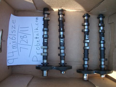 1994 Mazda MX-6 - Camshafts for a 1994 Mazda MX-6 are laid out in a cardboard box with a handwritten note.