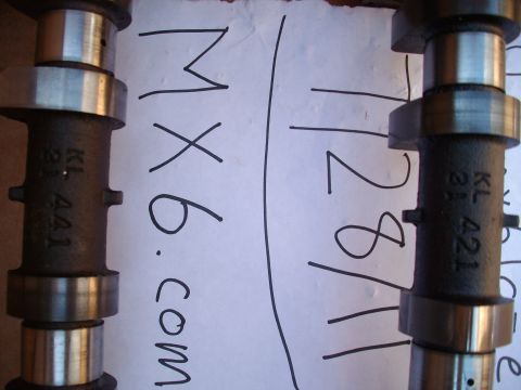 1994 Mazda MX-6 - Camshafts with part numbers and handwritten text are shown.