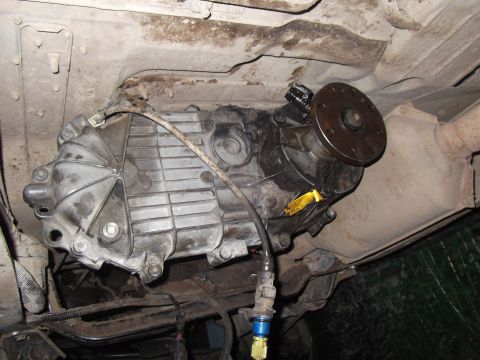 1989 Ford Bronco - Underside view of a vehicle's transfer case.