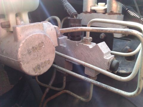 2007 Dodge Durango - Close-up of a brake master cylinder, showing stamped part numbers 51062 and 7888.