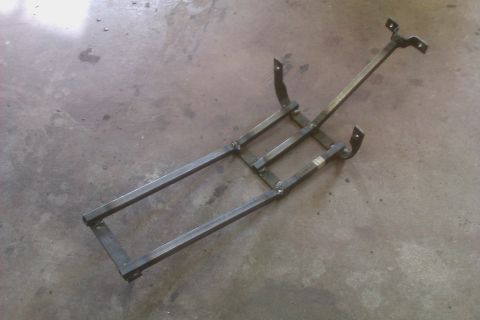 2002 Honda XR600R - A custom metal frame part is shown on a concrete surface. The registry claims it is for a 2002 Honda XR600R.