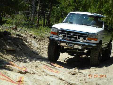 1996 Ford Bronco - White 1996 Ford Bronco navigates a challenging off-road course on July 29, 2011.