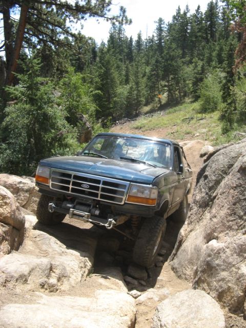 1995 Ford Bronco - This 1995 Ford Bronco is shown tackling a challenging off-road course.