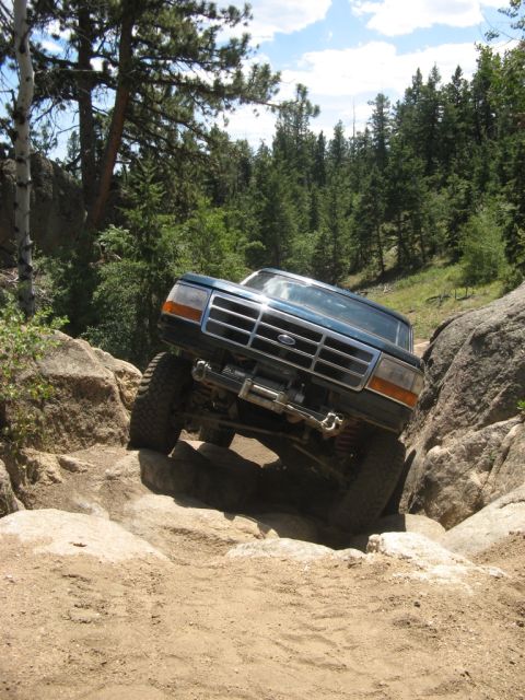 1995 Ford Bronco - This 1995 Ford Bronco is shown tackling a challenging off-road course.