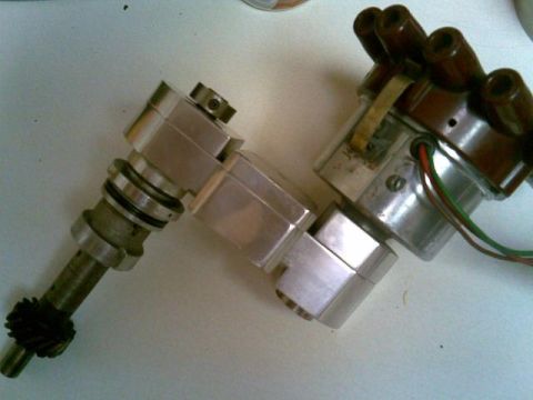 1972 Ford Ranchero - Close-up of an automotive distributor, a key component in older ignition systems.