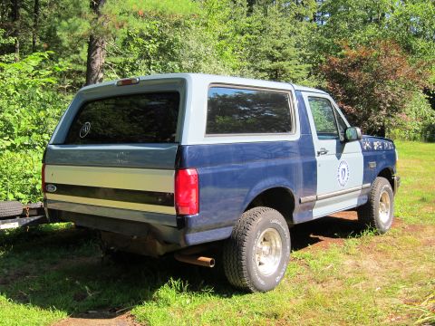1991 Ford Crown Victoria LTD - This Ford Bronco has a two-tone paint scheme and appears to be from the early to mid-1990s.