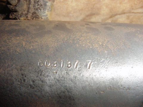 1992 Ford Bronco - A close-up view shows a part number stamped onto a metal tube, with a Supermotors.net logo visible.