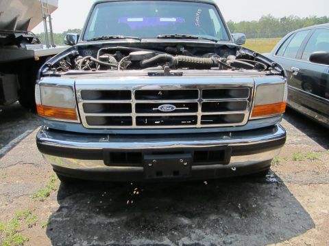 1991 Ford LTD Crown Victoria - The grille and headlights indicate this is a 1992-1997 Ford F-Series truck, not a 1991 Crown Victoria.