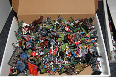 1978 Chevrolet C/K Pickup - A box filled with numerous miniature figures, likely for a tabletop game.