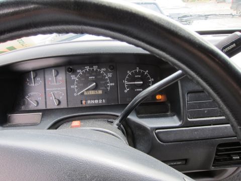 1991 Ford LTD Crown Victoria - Interior view of a vehicle's dashboard, showing gauges and steering wheel.