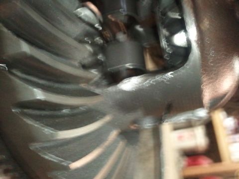 1995 Ford Bronco - Close-up view of differential gears, with a Supermotors.net logo visible in the lower right corner.