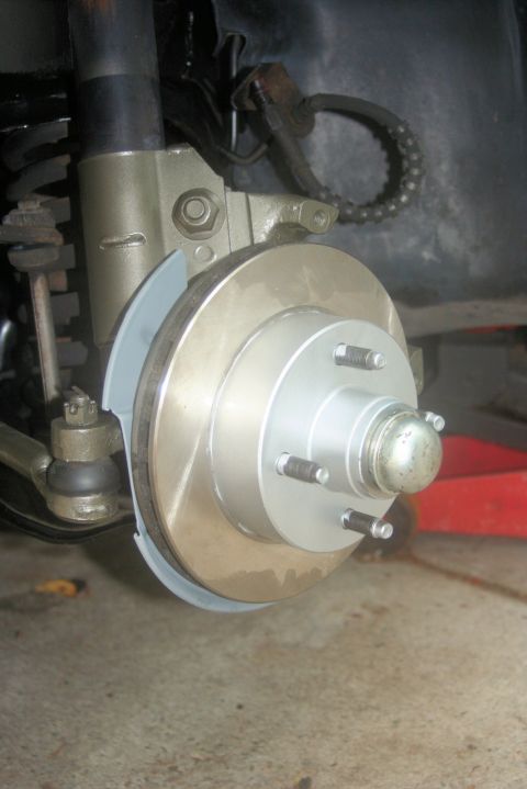 1980 Ford Mustang - Front brake assembly with new rotor and caliper shown.