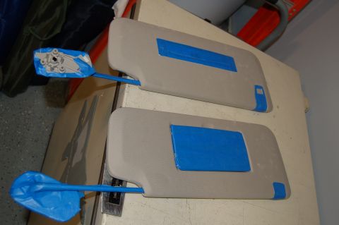 2007 Chevrolet Silverado 1500 - Sun visors are prepared with blue tape for a project.
