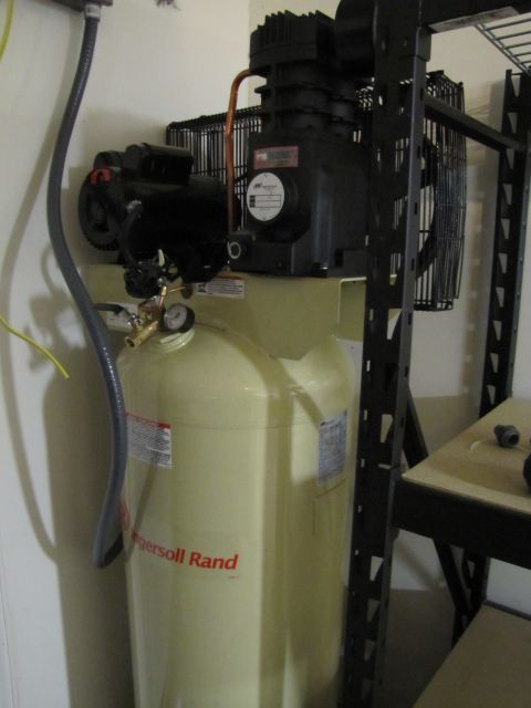 1993 Ford F-250 - An air compressor unit is shown with its tank and motor components visible.
