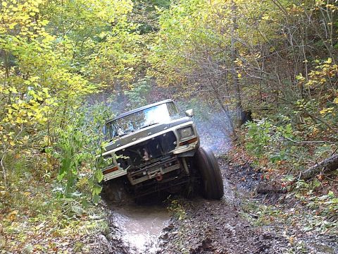 1978 Ford Bronco - This 1978 Ford Bronco tackles a challenging muddy off-road trail.