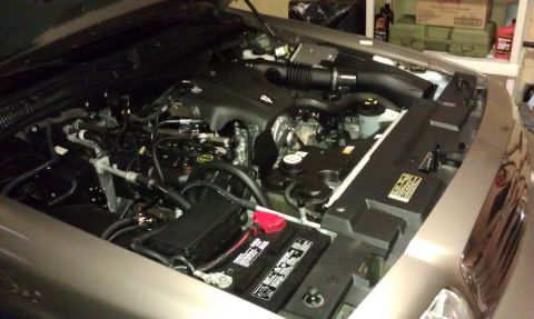 2007 Ford Crown Victoria - Engine bay of a 2007 Ford Crown Victoria, viewed from the front passenger side.