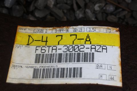 1996 Ford Bronco - A yellow and white label shows part information and a date of April 9, 1996.