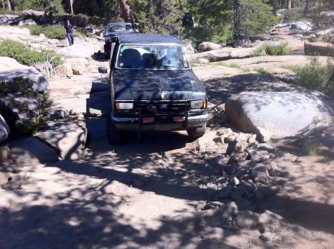 1990 Ford Bronco - This 1990 Ford Bronco is shown tackling a challenging off-road course.
