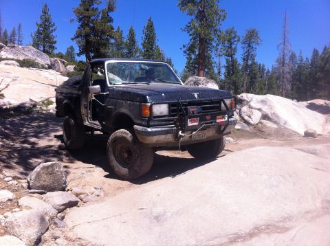 1990 Ford Bronco - This 1990 Ford Bronco navigates a challenging rocky trail.