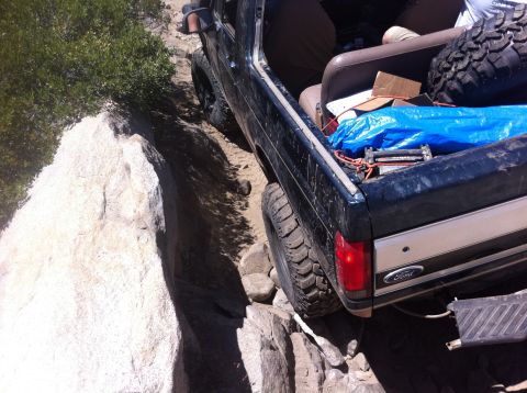 1990 Ford Bronco - This 1990 Ford Bronco is shown carefully maneuvering over a challenging rocky terrain.