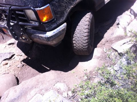 1990 Ford Bronco - This 1990 Ford Bronco tackles a challenging rocky trail, its off-road capability.